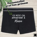 Un boxer noir avec écrit e ptit cul appartient à et tu personnalises avec un prénom